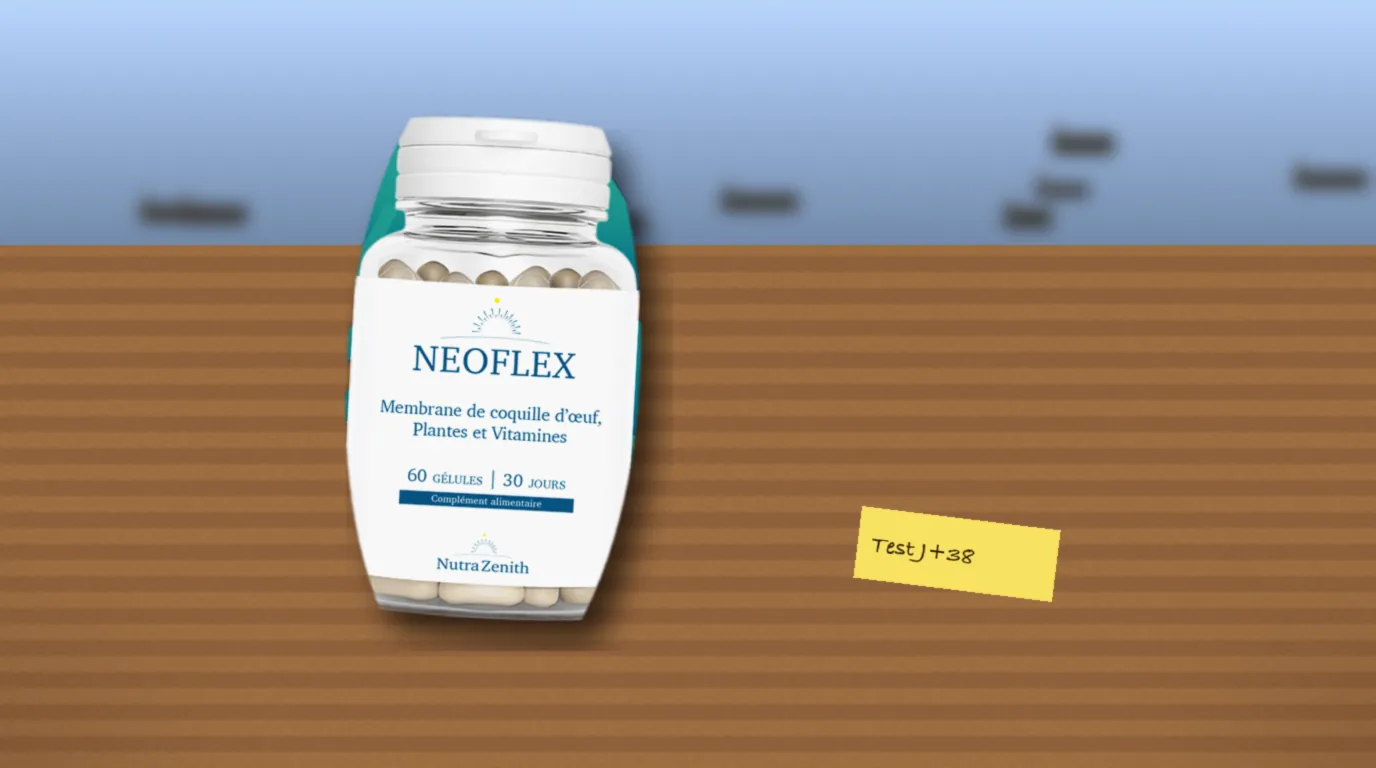 Photo de la boîte de Neoflex tenue par Olivier sur la terrasse